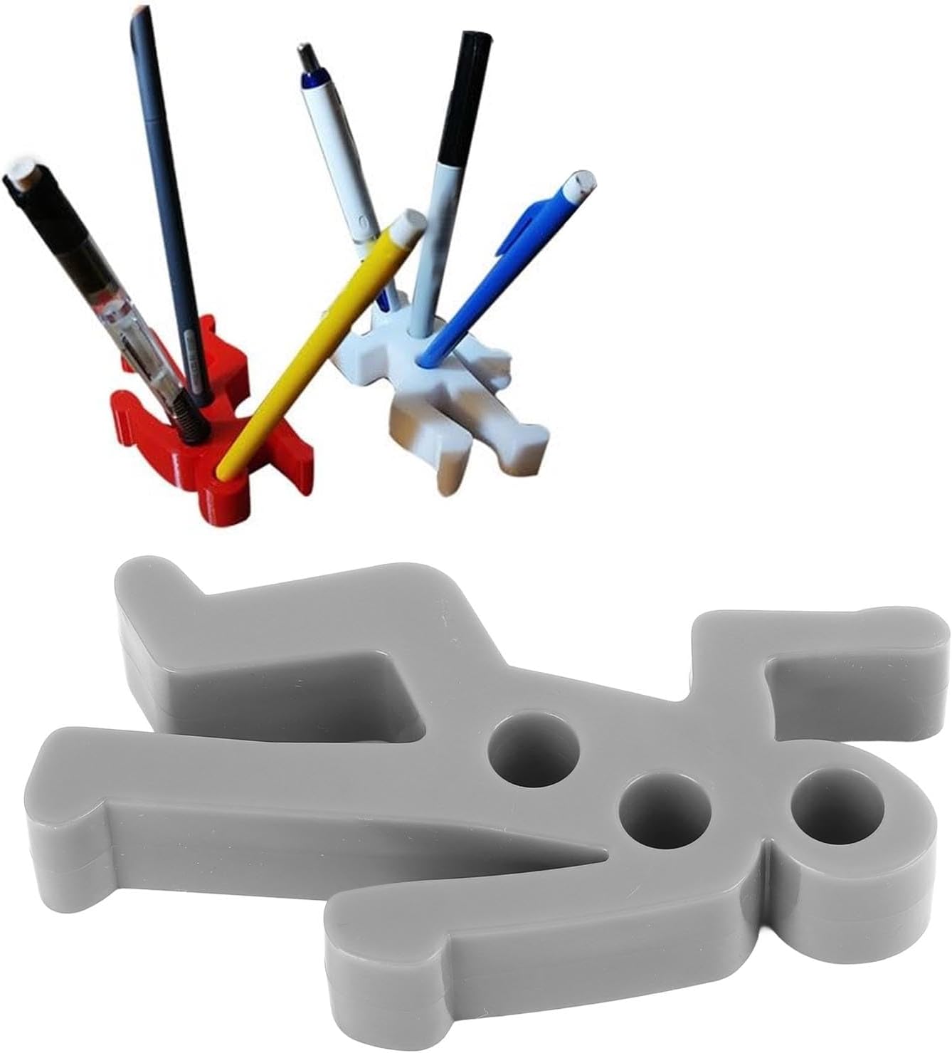 A novelty pen holder shaped like a chalk body outline, featuring a gray base with circular holes for storing pens and pencils, displayed with various writing instruments in red, black, blue, and yellow holders.